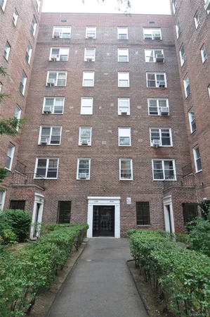 a front view of a multi story residential apartment building