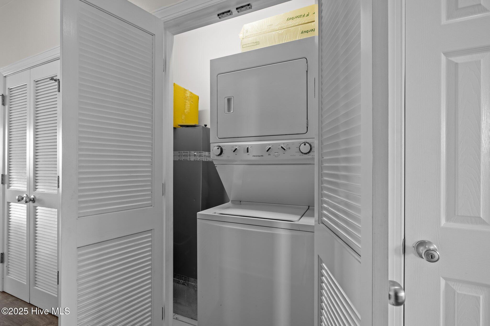 1701 Salter Path Road, Unit G102 Indian Beach, NC 28512 - Photo 23 of 35 Laundry Closet