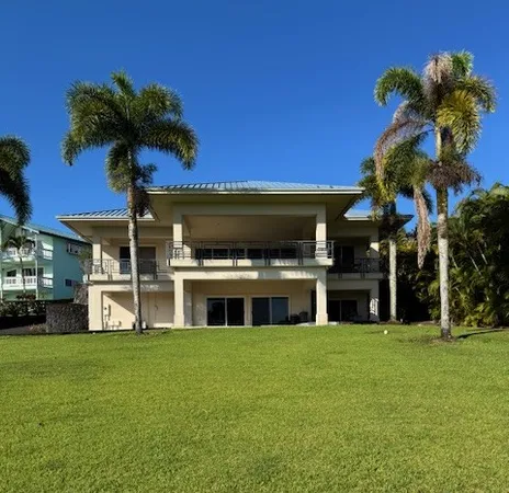 a view of a house with a swimming pool