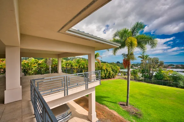 a view of yard with patio