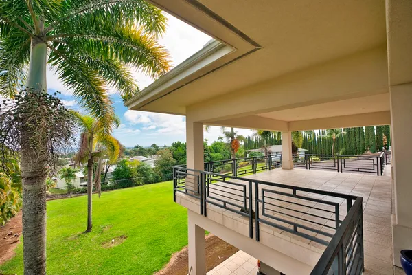 a view of a patio with a backyard