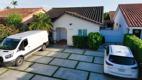 a house view with a outdoor space