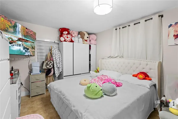 a bedroom with a bed and a bed