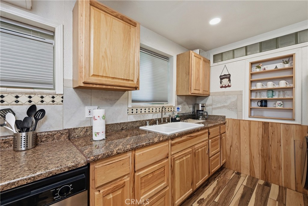 6025 Front Street Clearlake, CA 95422 - Photo 19 of 32 a kitchen with sink cabinets and window