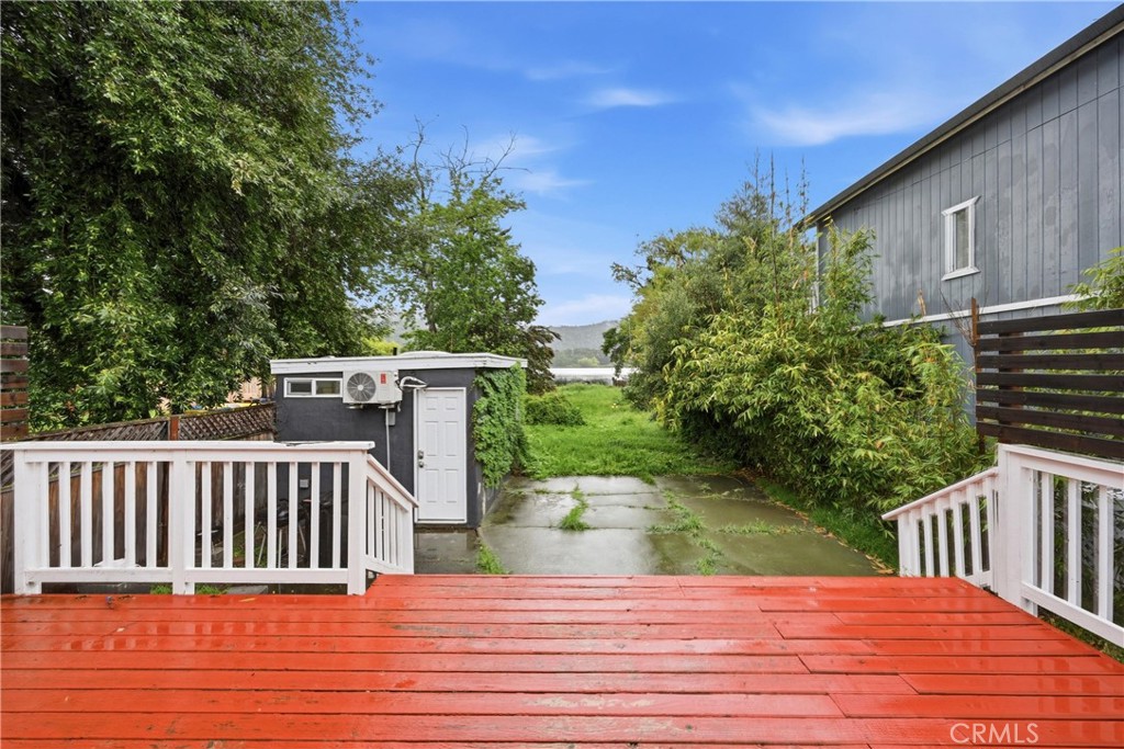 6025 Front Street Clearlake, CA 95422 - Photo 4 of 32 a view of a house with backyard and sitting area
