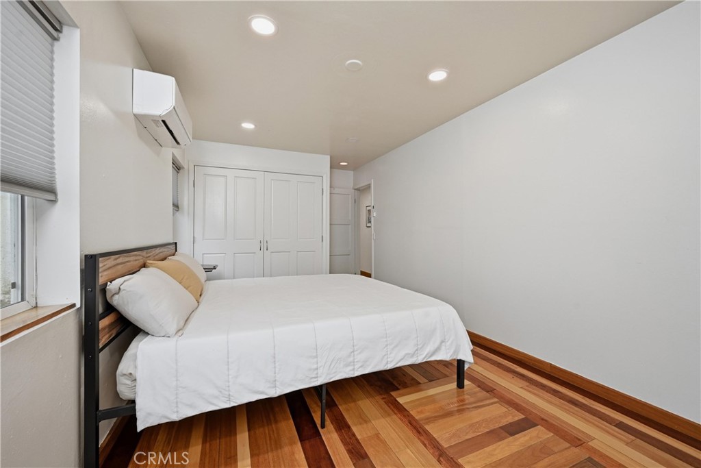 6025 Front Street Clearlake, CA 95422 - Photo 10 of 32 a bedroom with a bed and a dresser