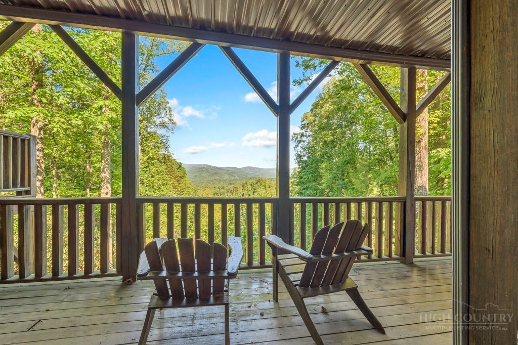 2229 Elk Ridge Road Ferguson, NC 28624 - Photo 39 of 42 a view of a two chairs in the balcony