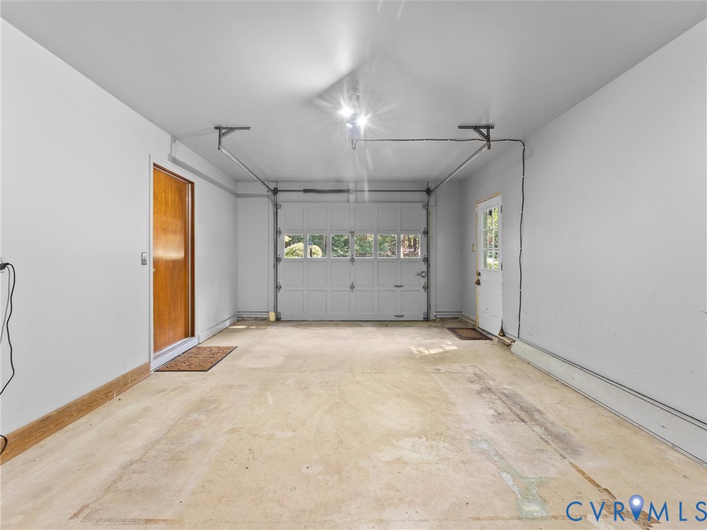 5904 Bent Creek Road Midlothian, VA 23112 - Photo 34 of 52 Single-car garage with a concrete floor, overhead