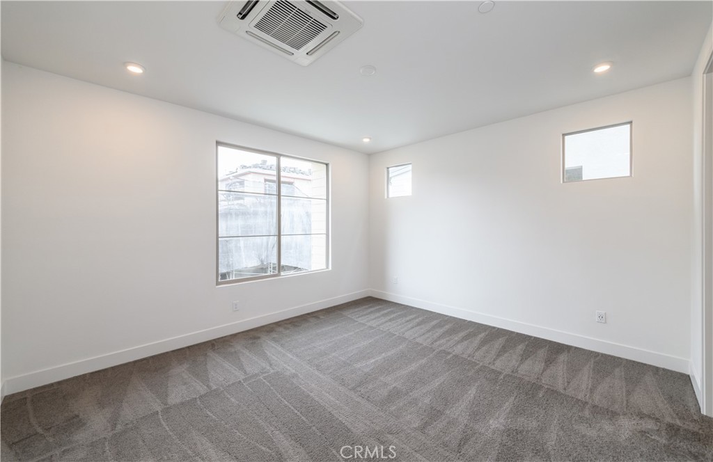 194 Abacus Irvine, CA 92618 - Photo 15 of 34 an empty room with windows