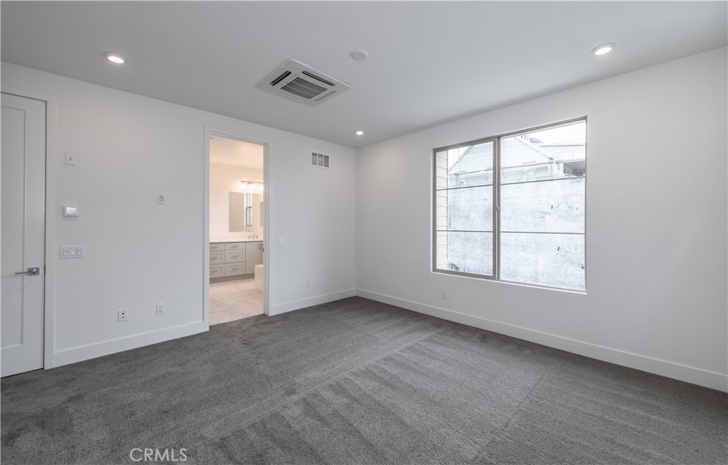 194 Abacus Irvine, CA 92618 - Photo 16 of 34 a view of an empty room with a window
