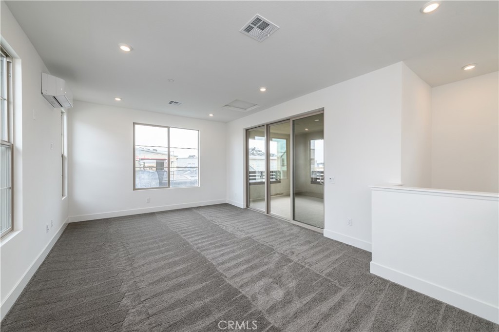 194 Abacus Irvine, CA 92618 - Photo 28 of 34 wooden floor in an empty room with a window