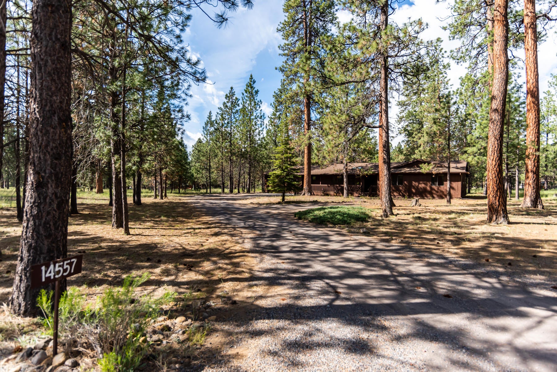 14557 Crossroads Loop Sisters, OR 97759 - Photo 2 of 25 Home is back off of the main road