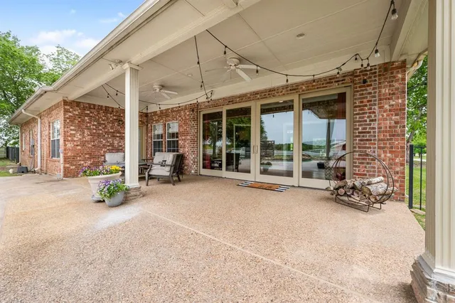 a view of a swimming pool with a lounge chairs