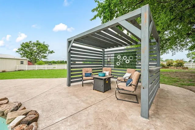 a view of a swimming pool with a patio