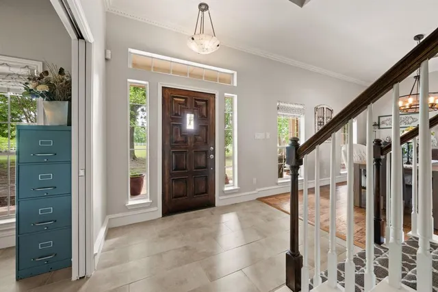 a view of entryway with stairs