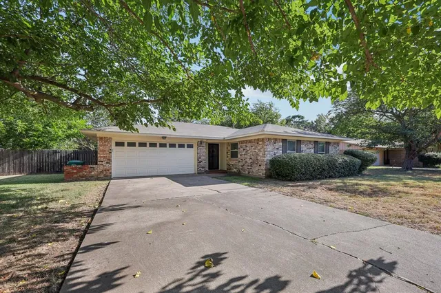 a house view with a outdoor space