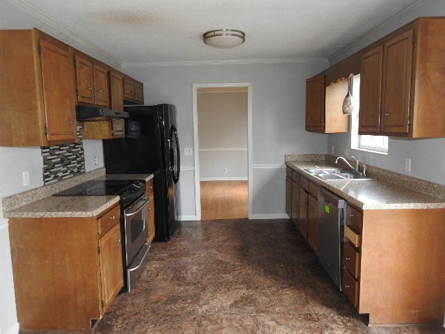 3405 Country Ridge Drive Antioch, TN 37013 - Photo 5 of 19 a kitchen with stainless steel appliances granite countertop a stove a refrigerator and a sink