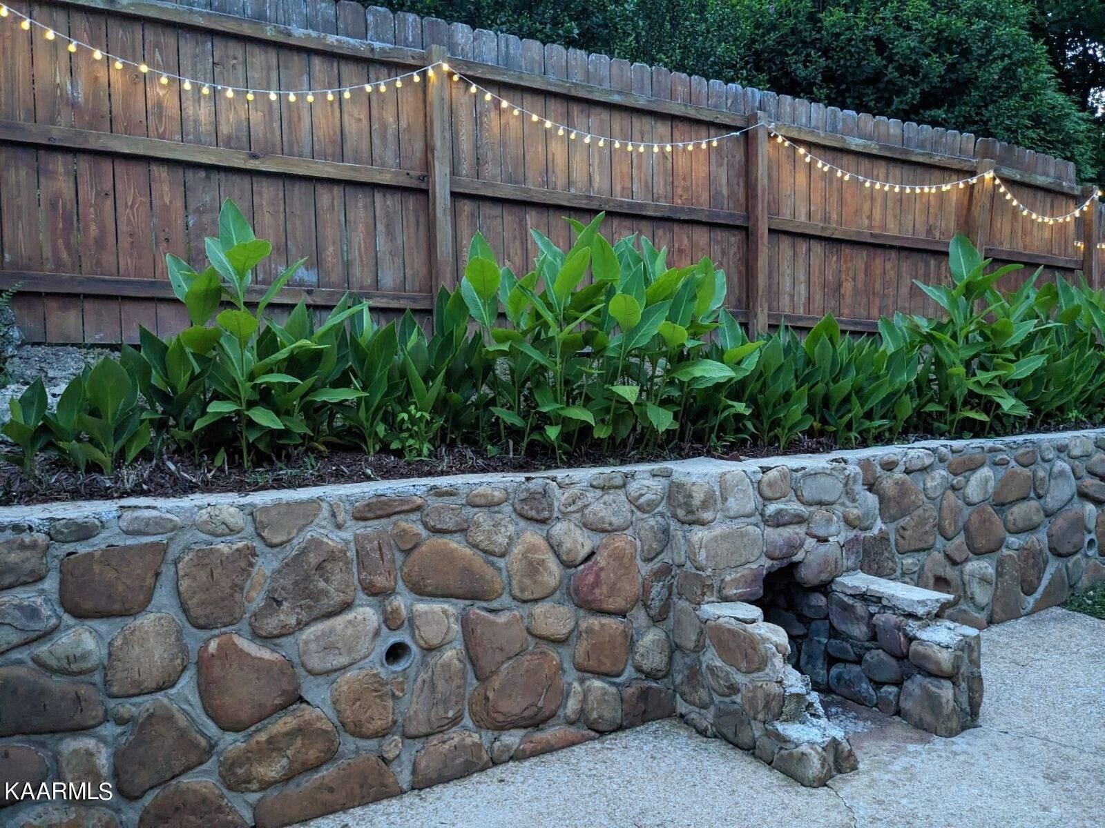 4518 Cloverdale Loop Hixson, TN 37343 - Photo 21 of 24 a view of a backyard with plants