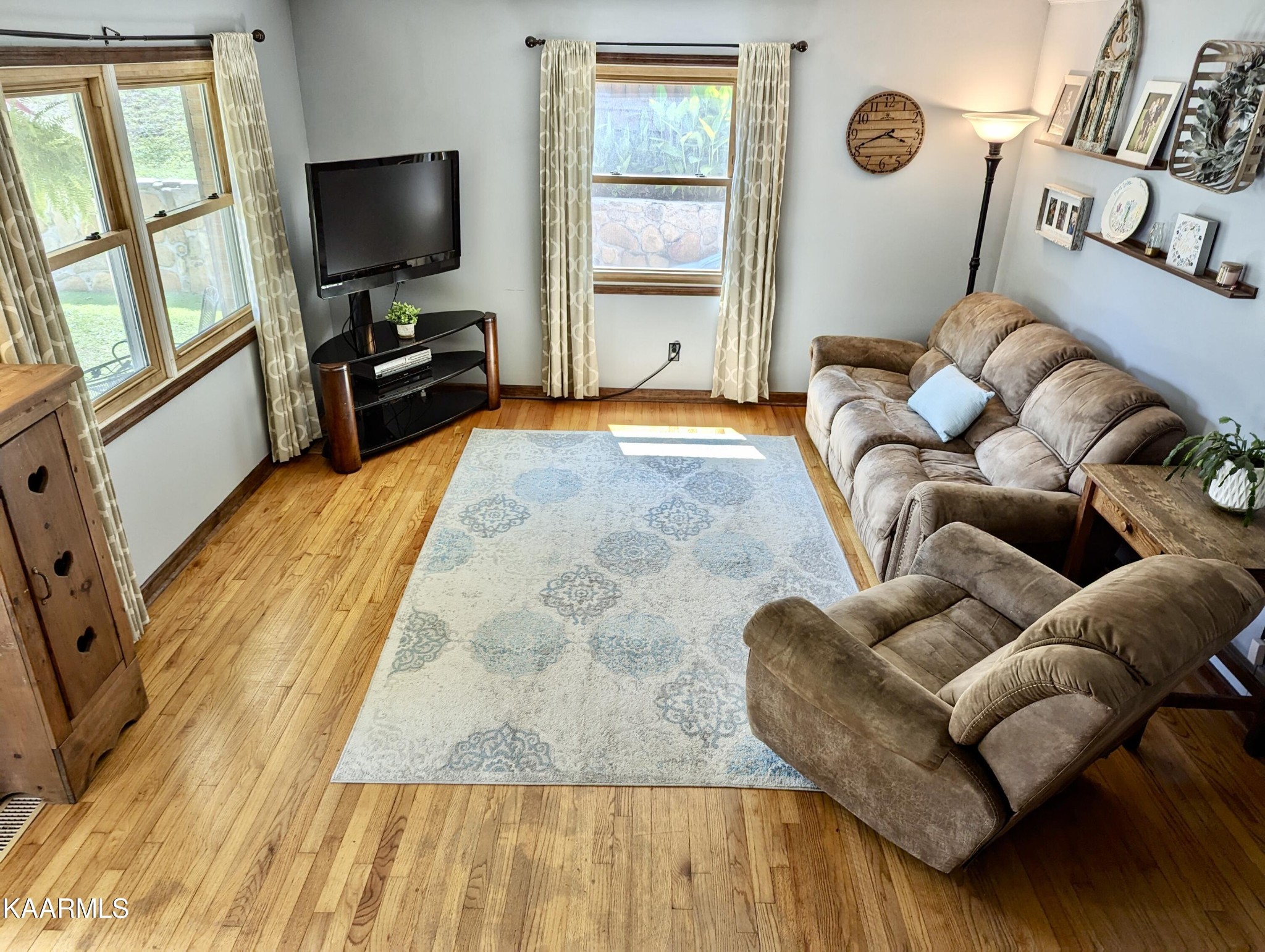 4518 Cloverdale Loop Hixson, TN 37343 - Photo 4 of 24 a living room with furniture and a flat screen tv