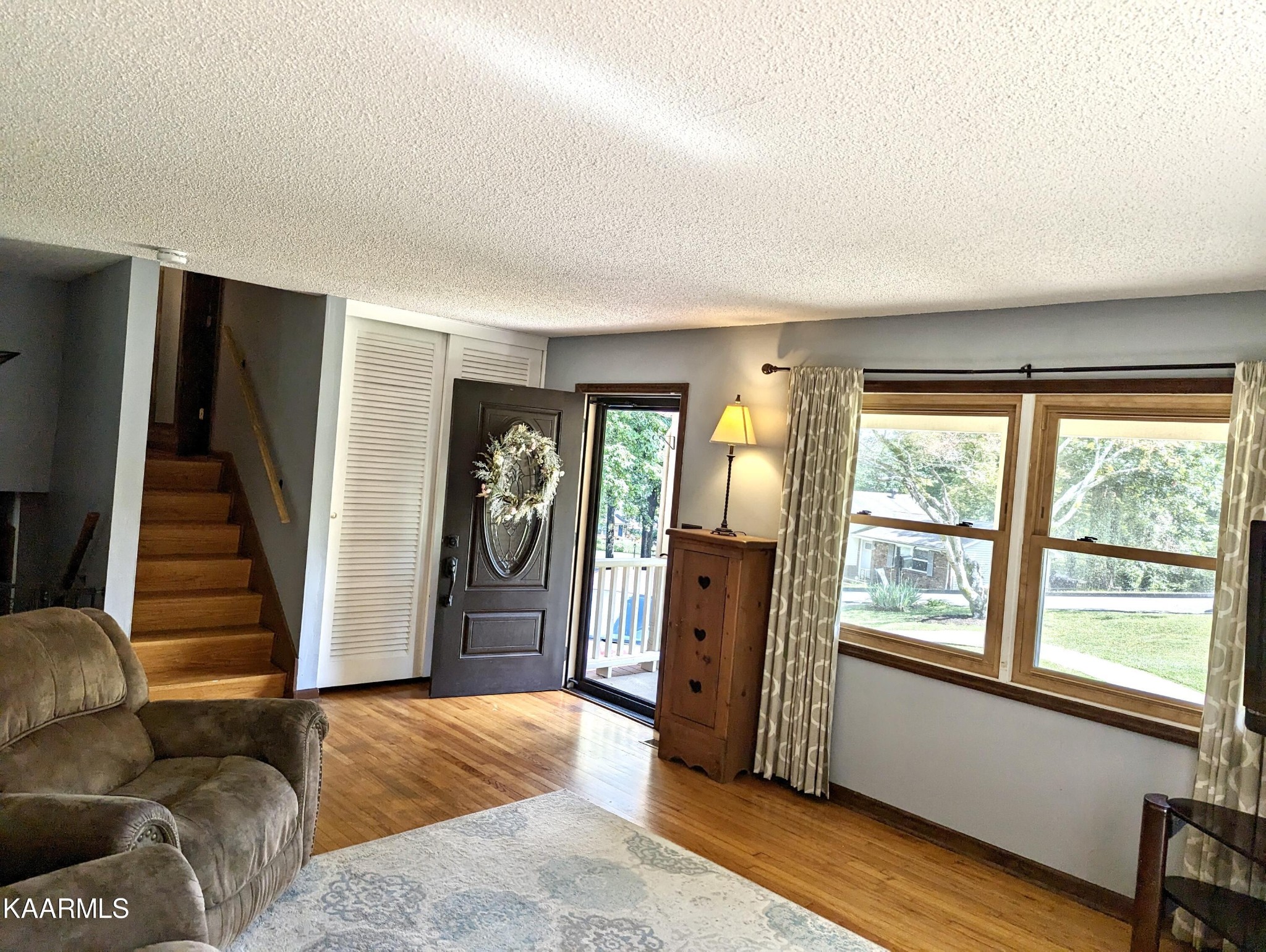 4518 Cloverdale Loop Hixson, TN 37343 - Photo 5 of 24 a living room with furniture and a window