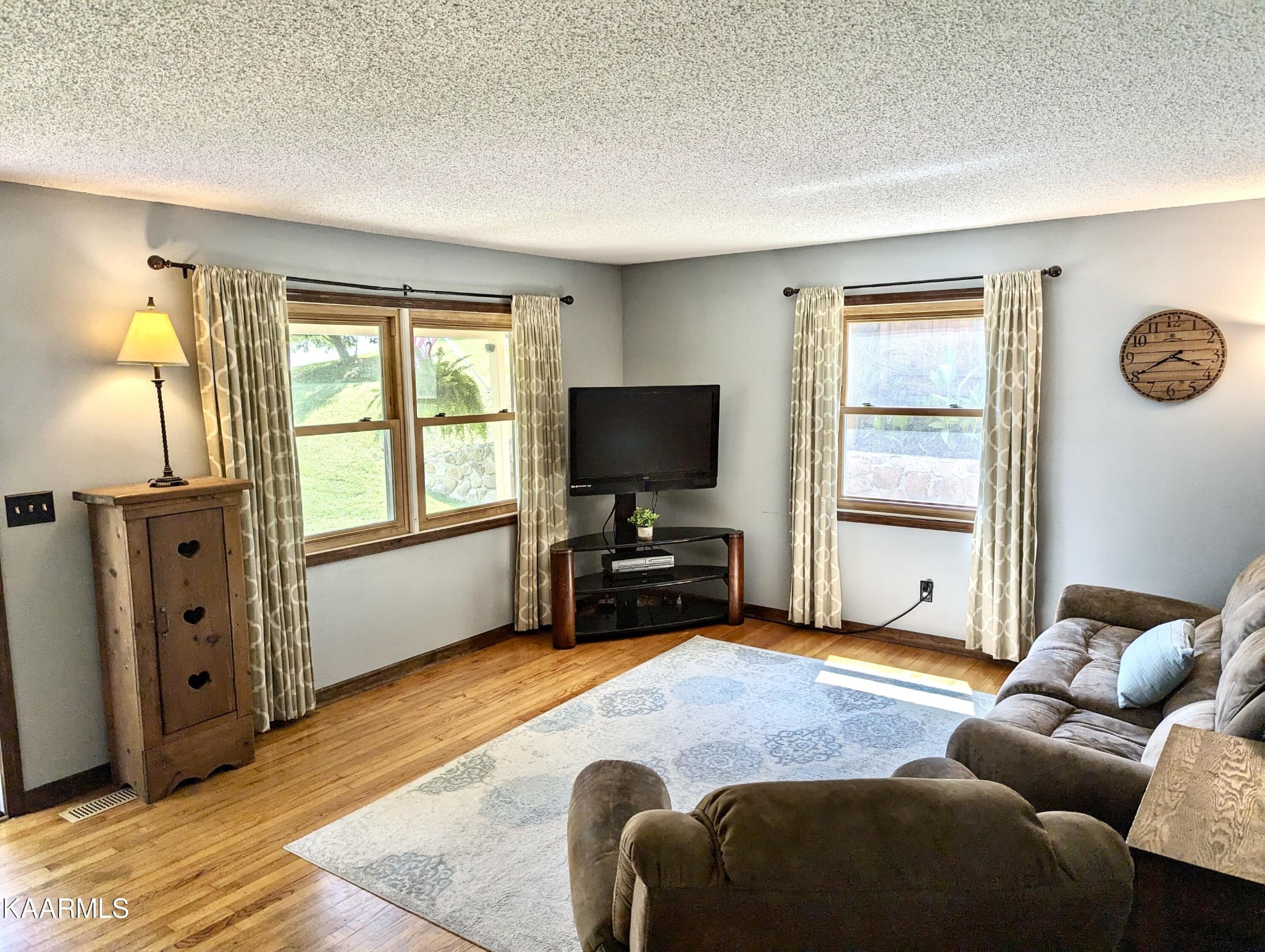 4518 Cloverdale Loop Hixson, TN 37343 - Photo 6 of 24 a living room with furniture and a flat screen tv
