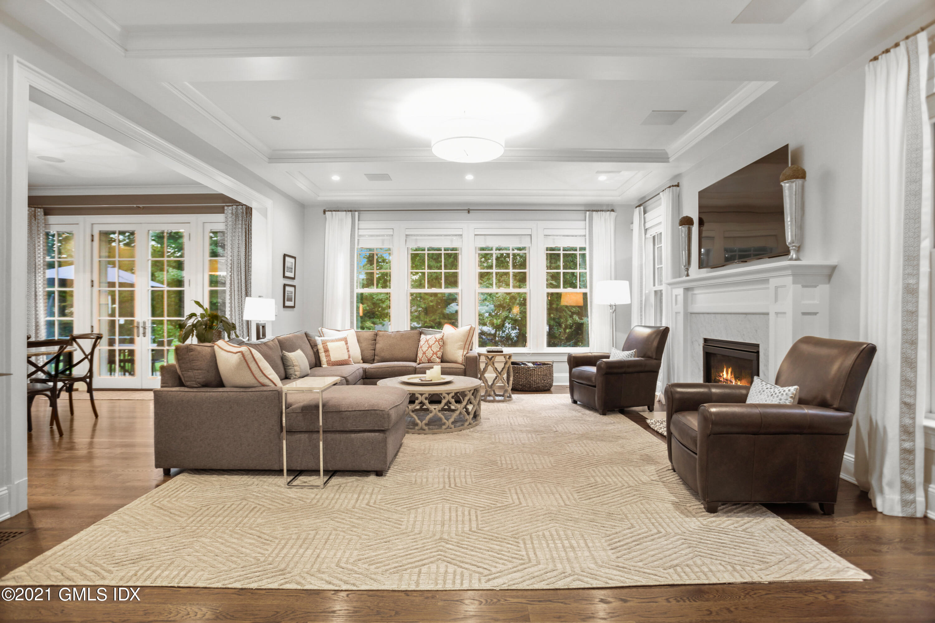 48 Winthrop Drive Riverside, CT 06878 - Photo 11 of 40 a living room with furniture fireplace and flat screen tv