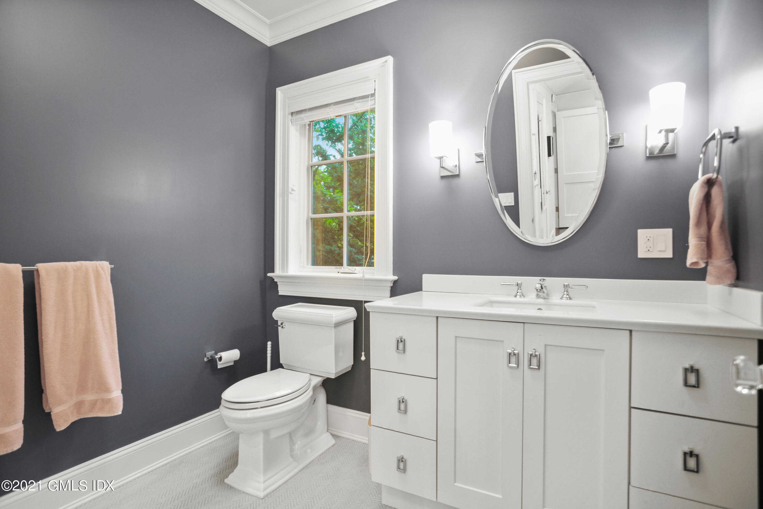 48 Winthrop Drive Riverside, CT 06878 - Photo 27 of 40 a bathroom with a toilet a sink and a mirror