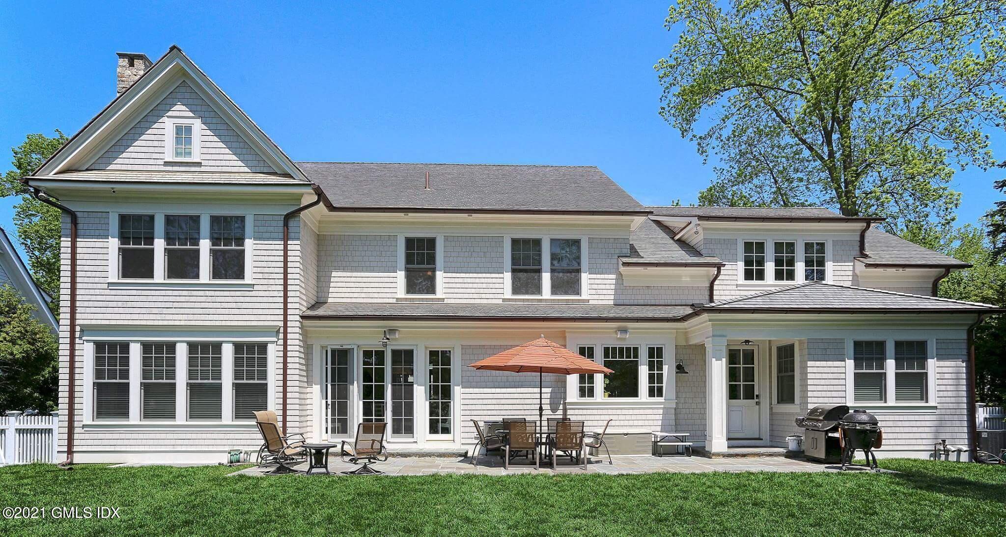 48 Winthrop Drive Riverside, CT 06878 - Photo 35 of 40 a front view of a house with a yard