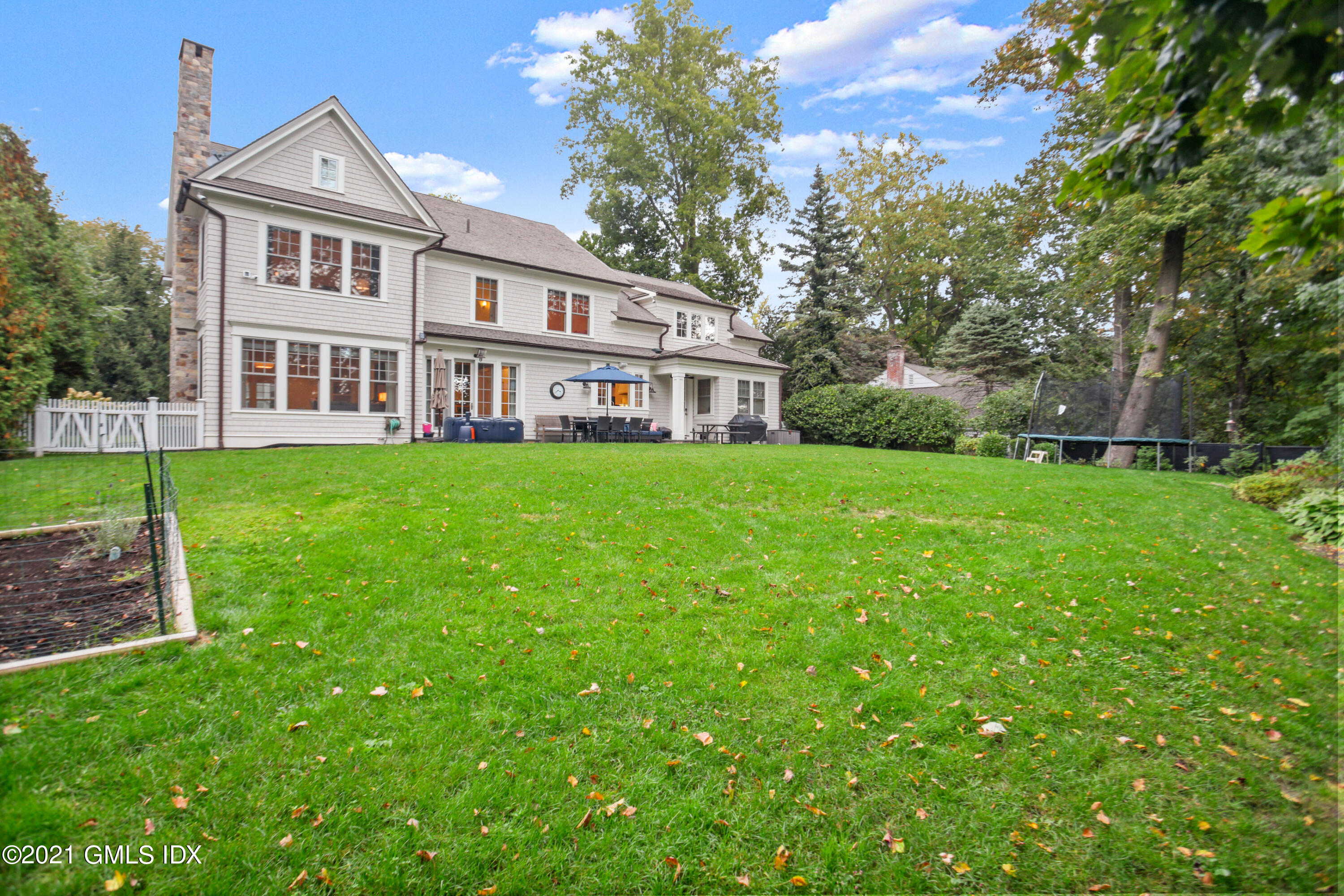 48 Winthrop Drive Riverside, CT 06878 - Photo 36 of 40 a view of a house with a yard