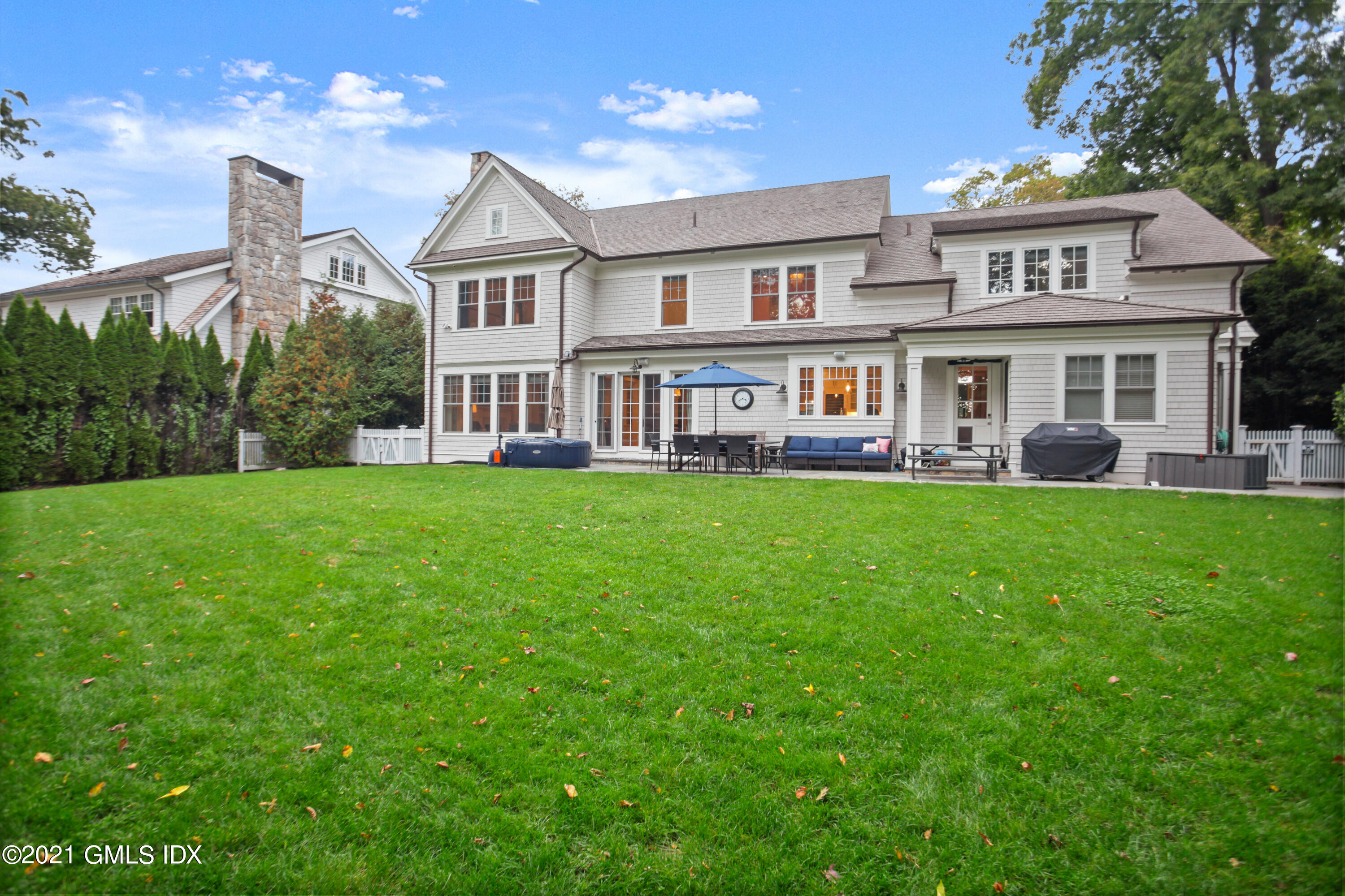 48 Winthrop Drive Riverside, CT 06878 - Photo 37 of 40 a view of a house with a garden and plants