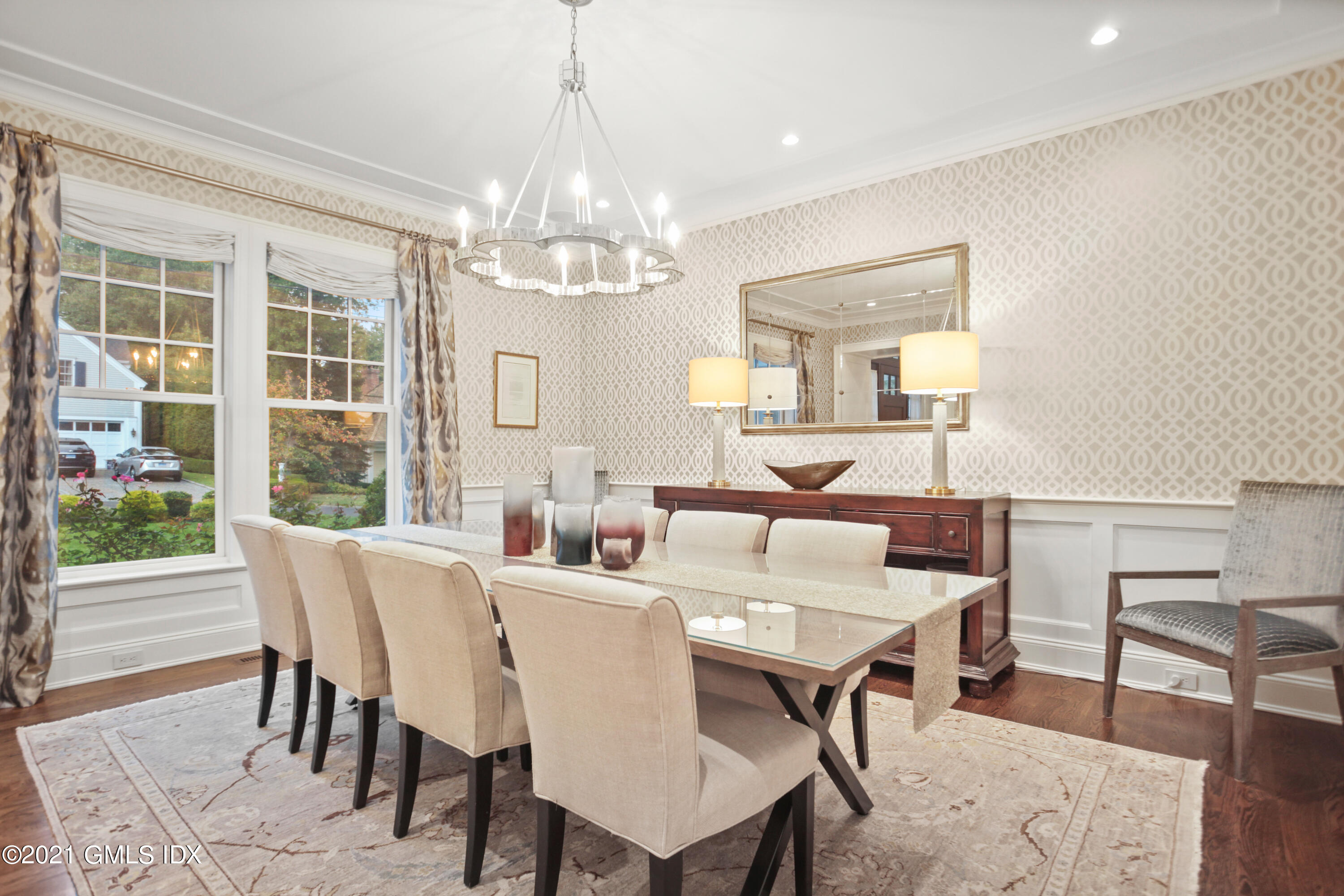 48 Winthrop Drive Riverside, CT 06878 - Photo 5 of 40 a view of a dining room with furniture a chandelier and wooden floor
