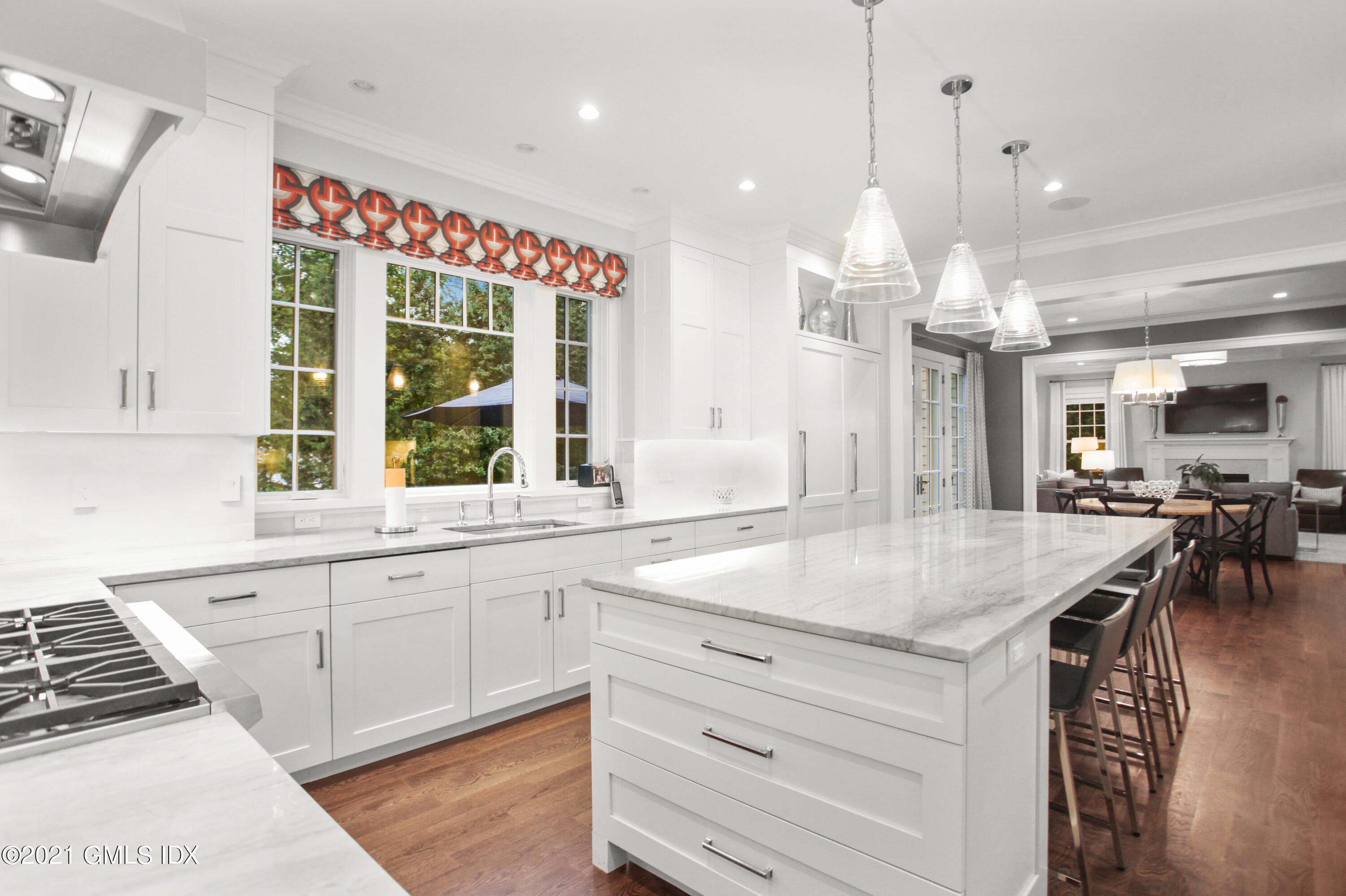 48 Winthrop Drive Riverside, CT 06878 - Photo 6 of 40 a kitchen with granite countertop a sink and a stove