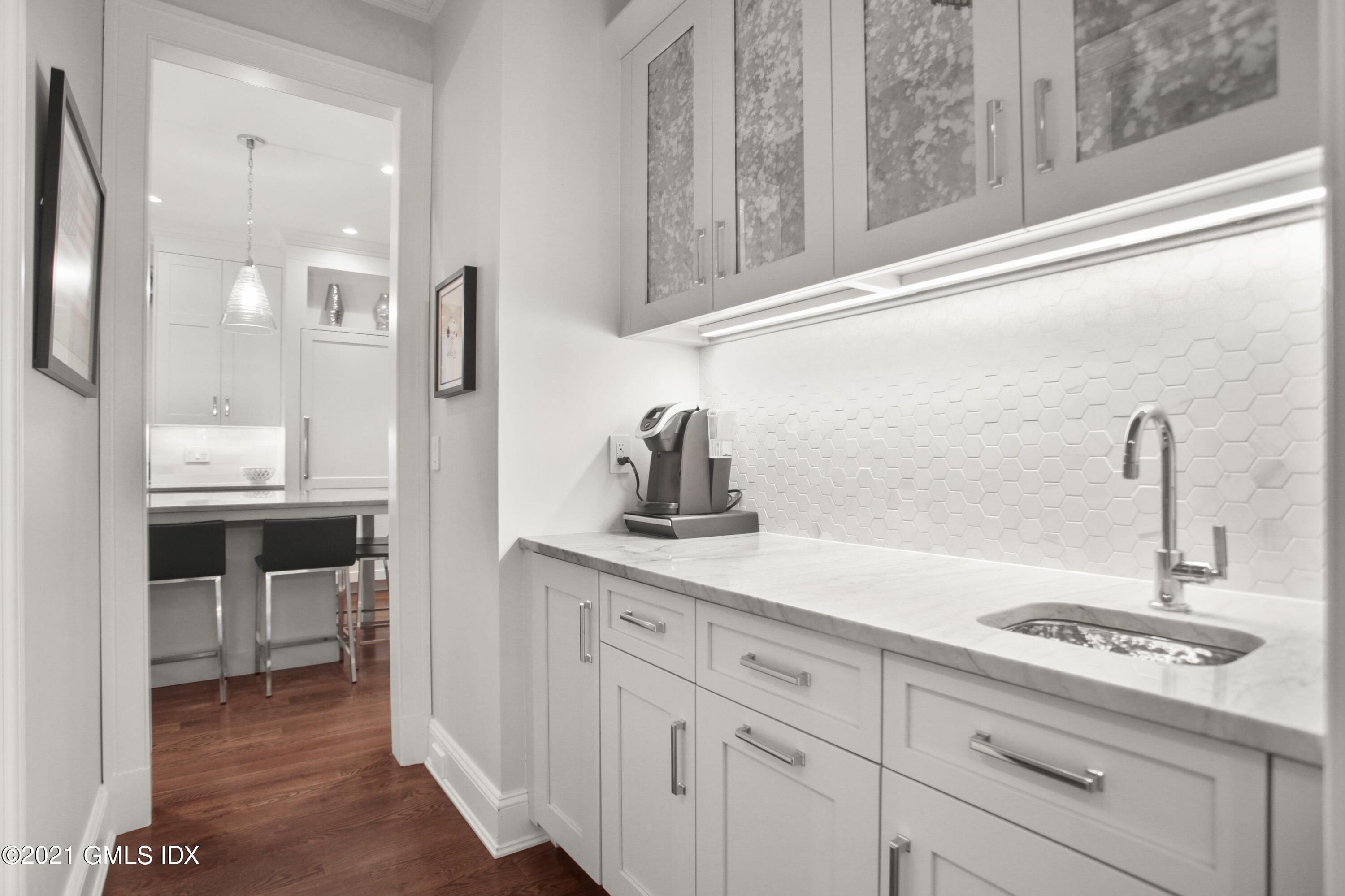 48 Winthrop Drive Riverside, CT 06878 - Photo 9 of 40 a kitchen with a sink and cabinets