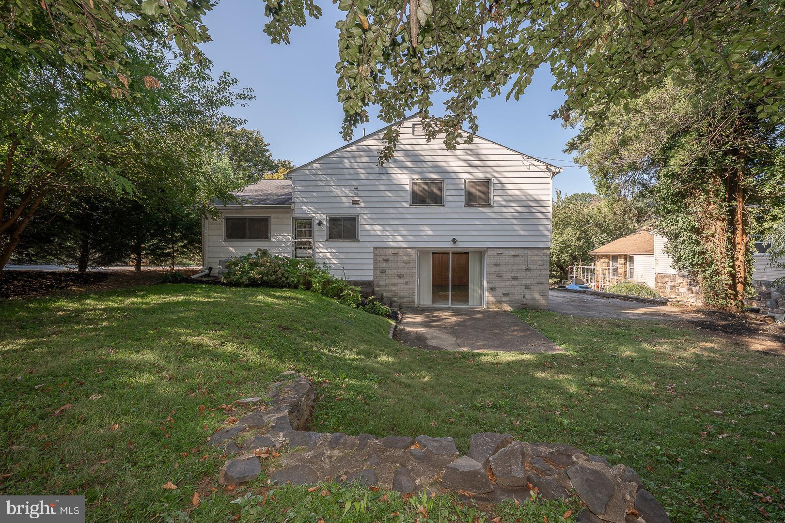 621 Conshohocken State Road Bala Cynwyd, PA 19004 - Photo 29 of 30 a front view of house with yard and green space