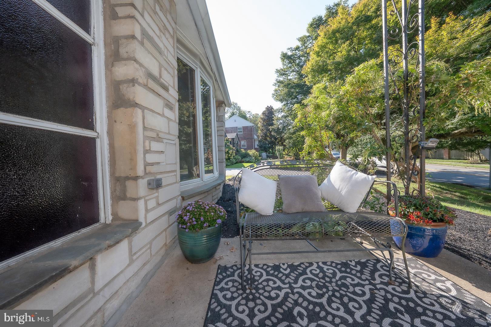 621 Conshohocken State Road Bala Cynwyd, PA 19004 - Photo 3 of 30 a view of a patio with chair and potted plants