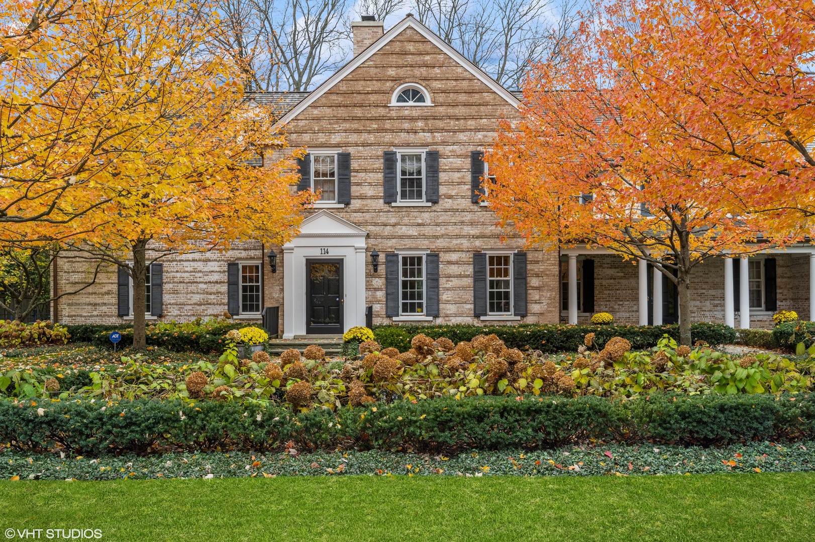 114 Dewindt Road Winnetka, IL 60093 - Photo 1 of 62 front view of a house with a yard