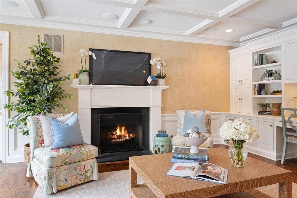 114 Dewindt Road Winnetka, IL 60093 - Photo 24 of 62 a living room with furniture and a fireplace