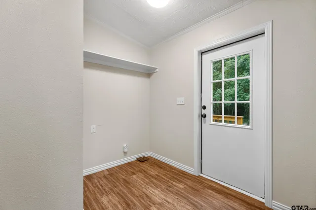 a view of a room that has a window in it