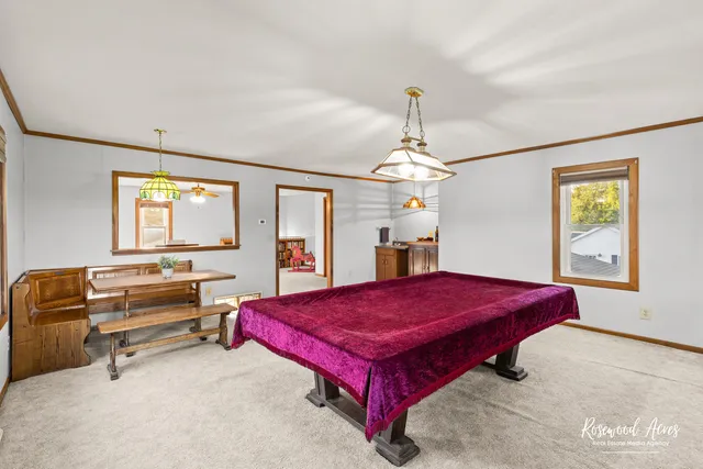 a living room with furniture and windows