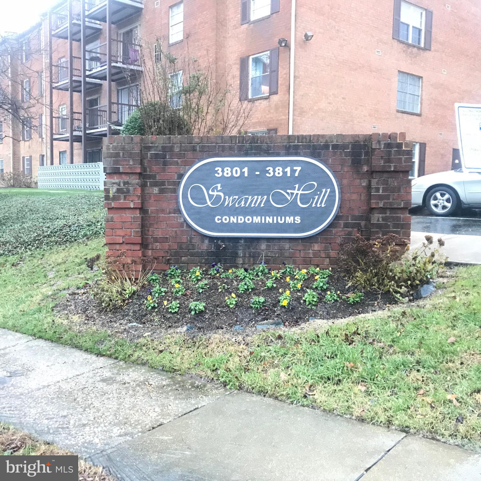 3807 Swann Road, Unit T1 Suitland, MD 20746 - Photo 8 of 8 a sign on the side of a building