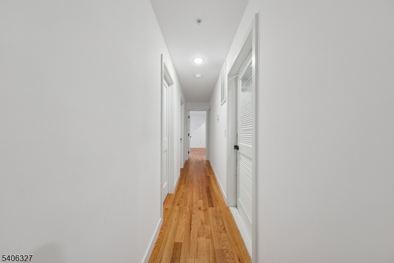 52 James Street, Unit 2 Newark, NJ 07102 - Photo 10 of 27 a view of a hallway with a white door