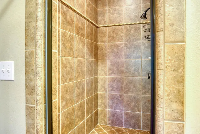 a bed room with a bed and a window