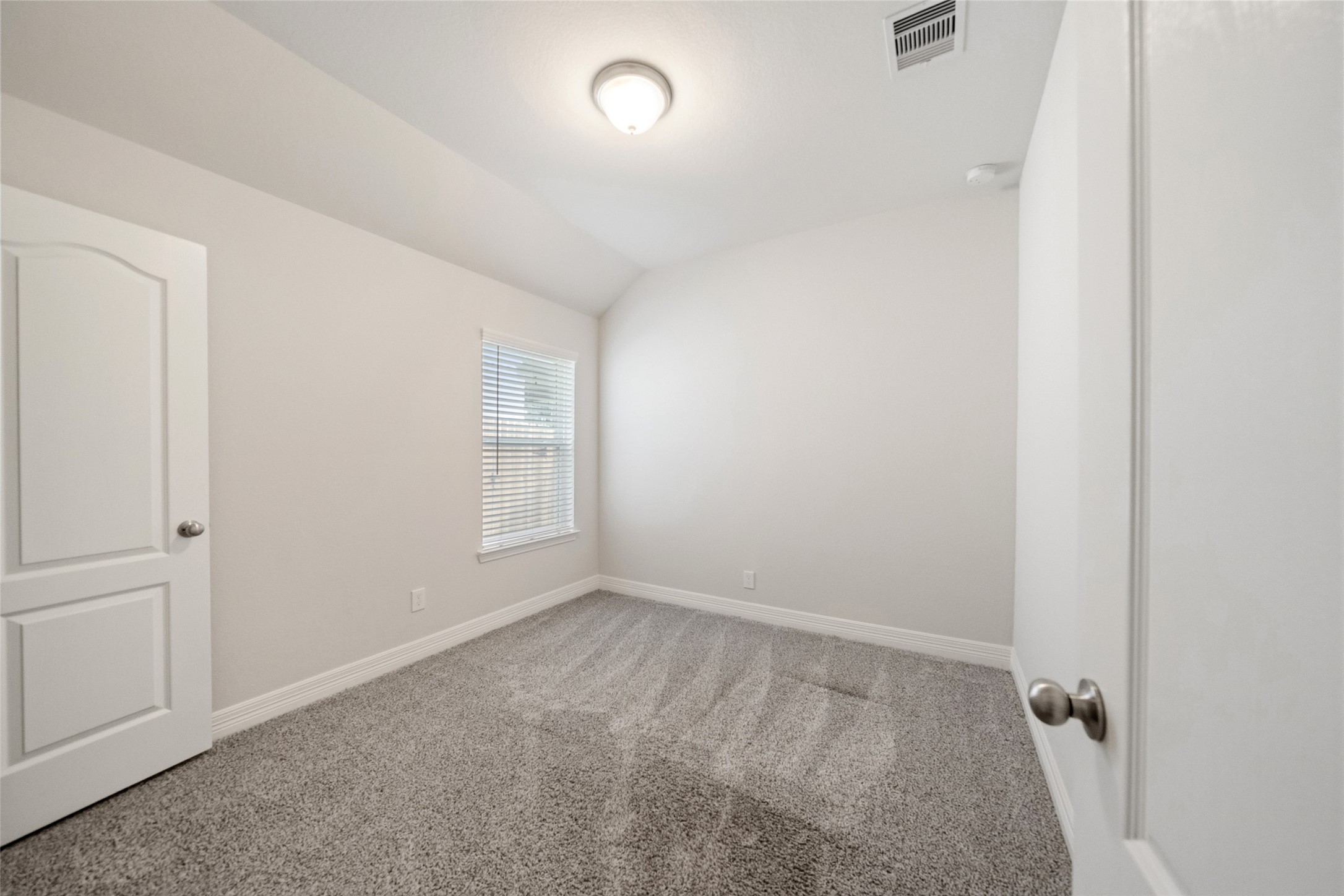 22642 Rosebush Hl Road Tomball, TX 77377 - Photo 23 of 27 an empty room with windows