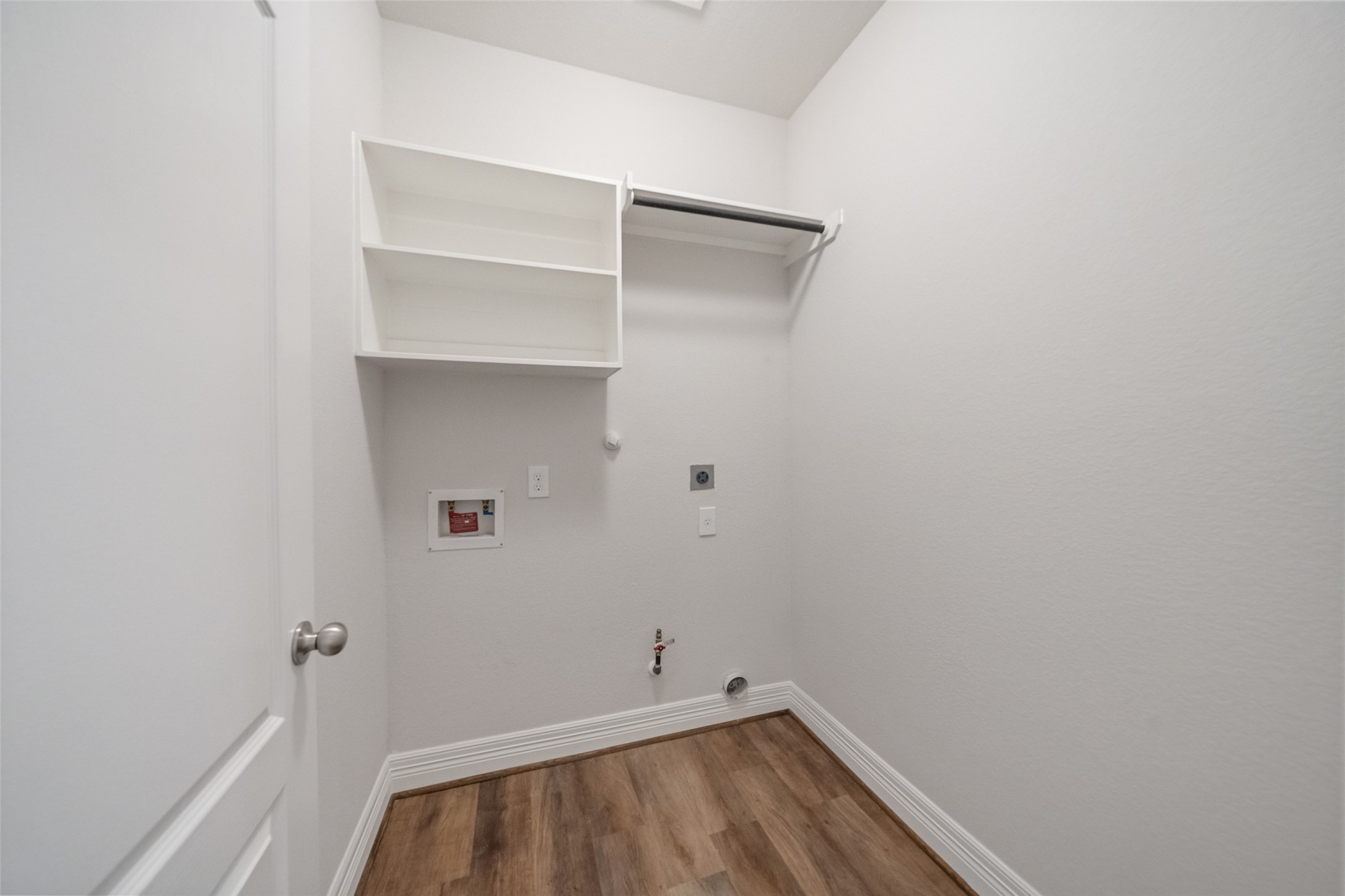 22642 Rosebush Hl Road Tomball, TX 77377 - Photo 24 of 27 a view of small space with racks on the wall