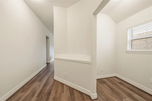 a view of small space with wooden floor