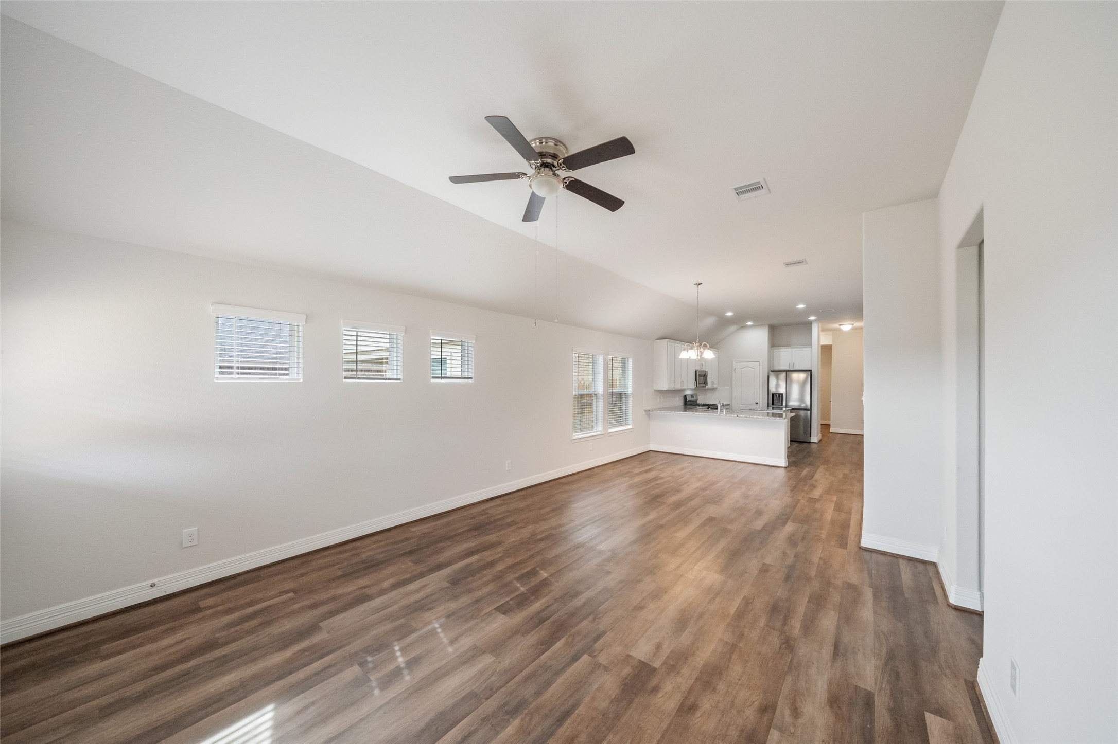 22642 Rosebush Hl Road Tomball, TX 77377 - Photo 10 of 27 a view of empty room with wooden floor