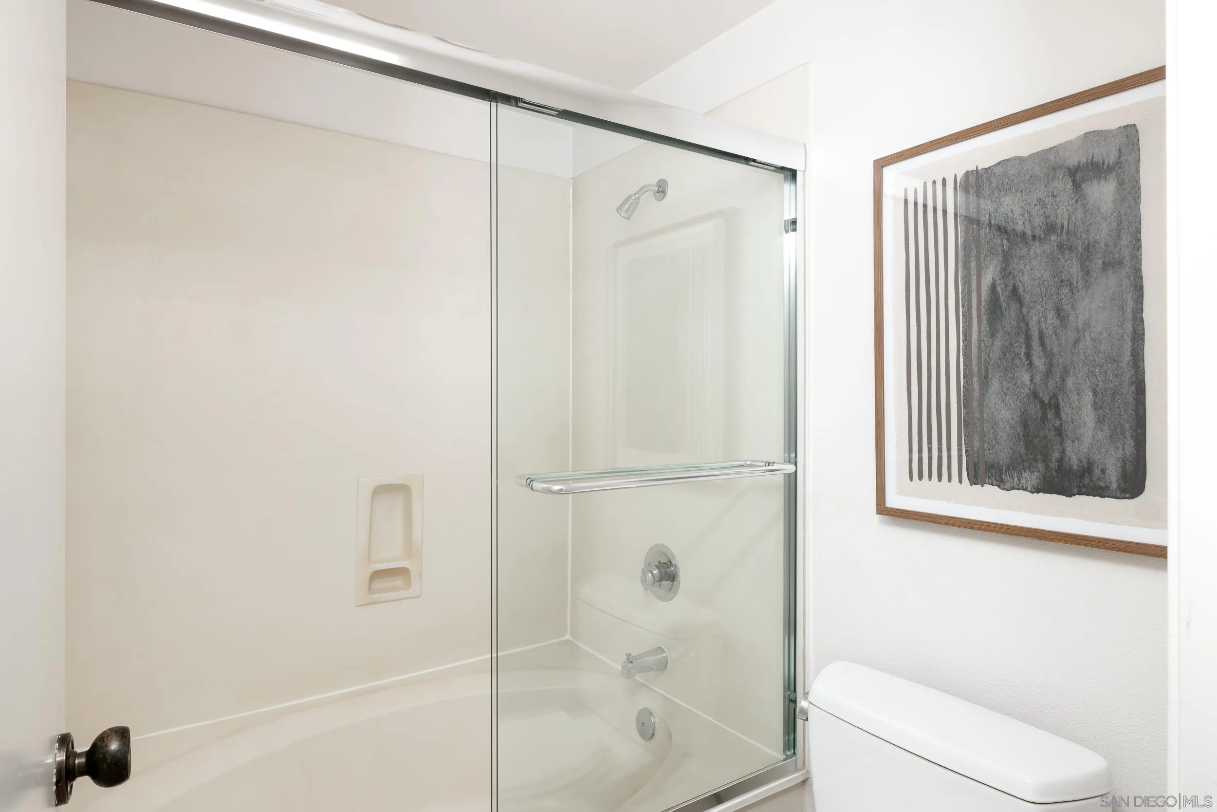 7306 Alta Vista Carlsbad, CA 92009 - Photo 13 of 22 a bathroom with a shower and a toilet