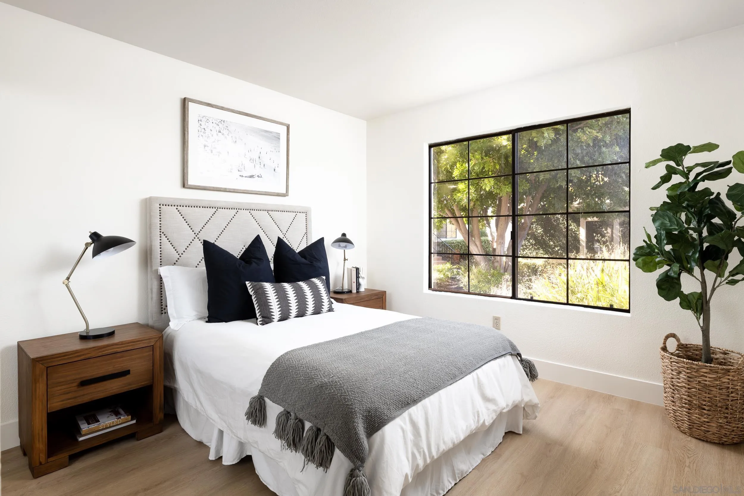 7306 Alta Vista Carlsbad, CA 92009 - Photo 14 of 22 a bedroom with bed and a window