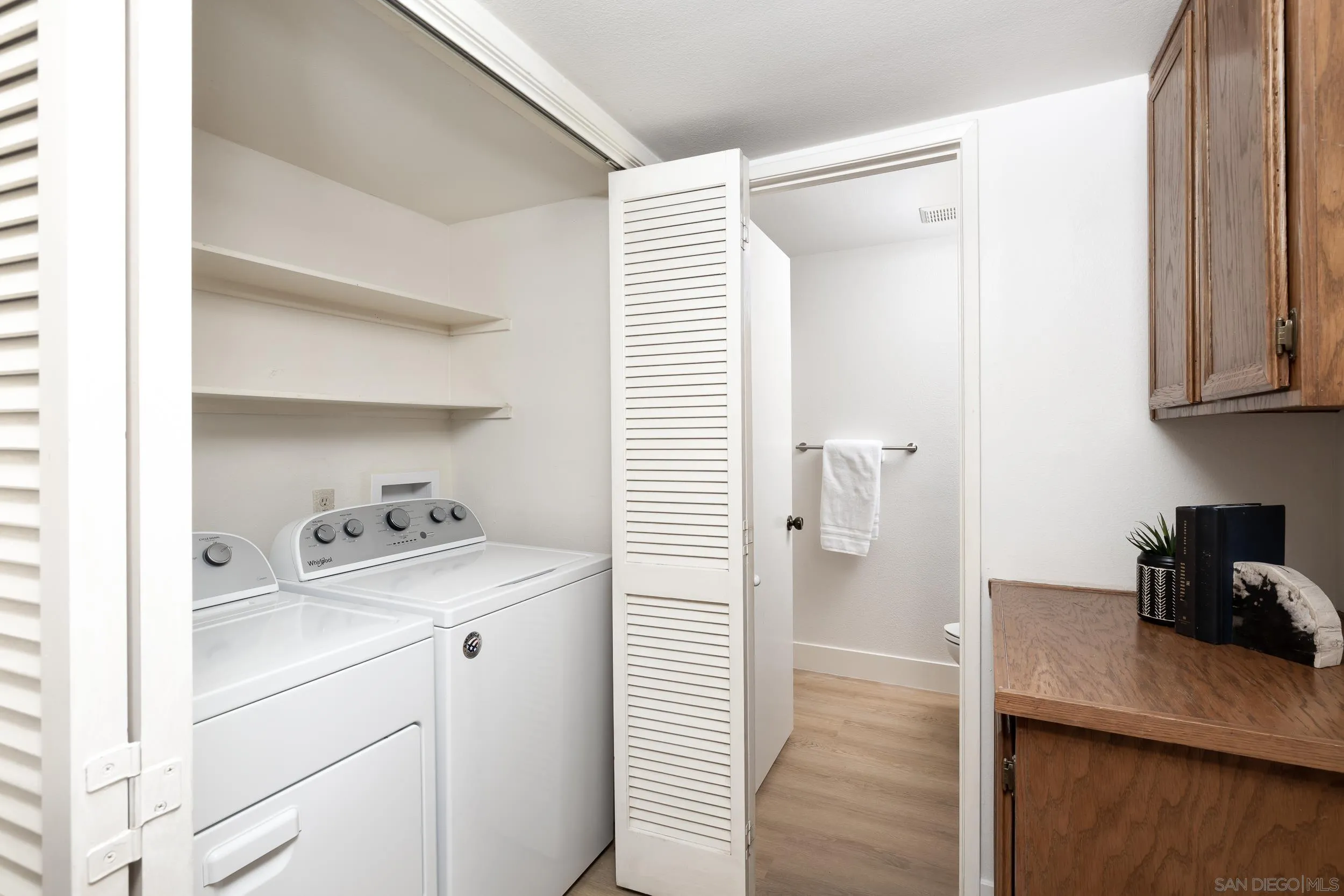 7306 Alta Vista Carlsbad, CA 92009 - Photo 16 of 22 a kitchen with a sink and cabinets