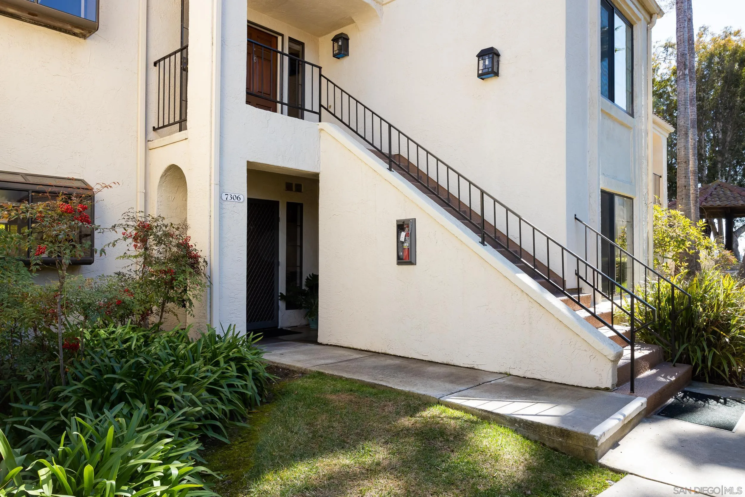7306 Alta Vista Carlsbad, CA 92009 - Photo 2 of 22 a view of a house with a yard